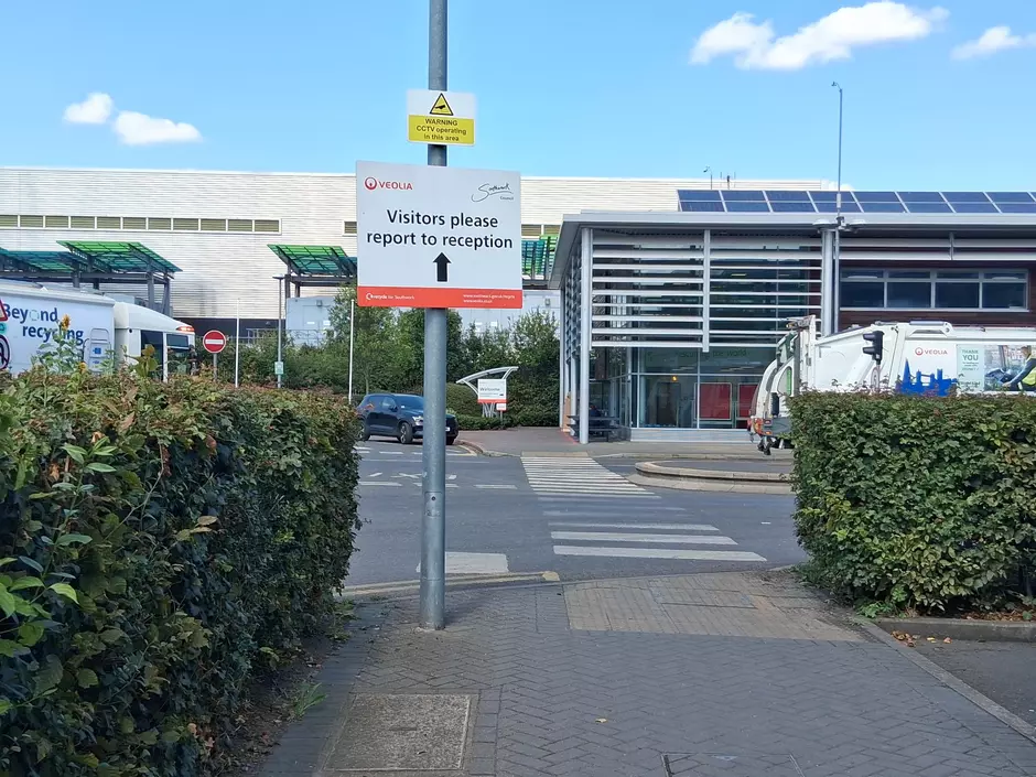 A photo of the road, pedestrian crossing and Southwark reception building